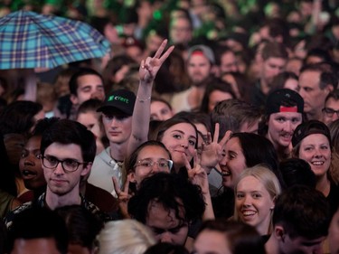 Half Moon Run fans cheer as they wait for the band to perform at the Montreal International Jazz Festival in Montreal on Wednesday June 28, 2017.
