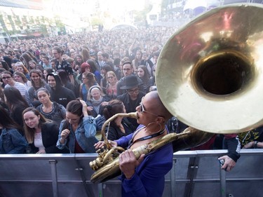 The Urban Brass Science Band warms up the crowd before the Milk & Bone performance at the Montreal International Jazz Festival in Montreal on Wednesday June 28, 2017.