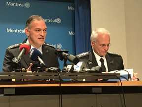 Montreal police chief Philippe Pichet, left, and Didier Deramond, deputy director of operations, present the SPVM's annual report to journalists on Wednesday, June 28, 2017.