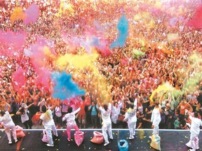 Flour power: The Colour of Time by ARTONIK ends with crowds being immersed in coloured flour.
