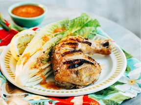 Chicken is served with a grilled romaine salad in this recipe from Home and Away by Darcy and Randy Shore.