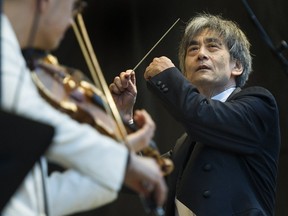 OSM musical director Kent Nagano conducts at a Pierrefonds concert Thursday night on behalf of residents affected by spring flooding.