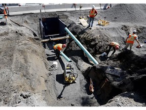 MONTREAL, QUE.: JULY 11, 2016-- Work crews connect sewer pipes to buildings on the west side of the street as work continues on Saint-Denis in Montreal on Monday July 11, 2016.  (Allen McInnis / MONTREAL GAZETTE) ORG XMIT: 56657
Allen McInnis, Montreal Gazette