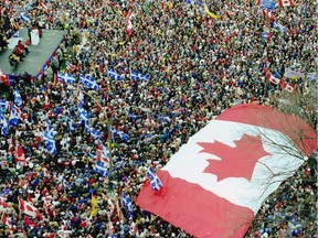 An oversize Maple Leaf dominates a rally at Place du Canada in Montreal in support of Canadian unity in the days before the 1995 Quebec referendum. Today, Quebecers "have made tremendous strides in Canada and the rationale for sovereignty is hard to find,” says Jack Jedwab of the Association for Canadian Studies.