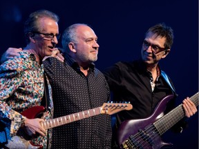 Michel Cusson, left to right, Paul Brochu and Alain Caron of UZEB take a bow before performing as part of the Montreal International Jazz Festival in Montreal on Thursday June 29, 2017.