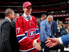 Cale Fleury meets with executives after being selected 87th overall by the Montreal Canadiens during the 2017 NHL Draft at the United Center on June 24, 2017 in Chicago, Illinois.  (Photo by Bruce Bennett/Getty Images)