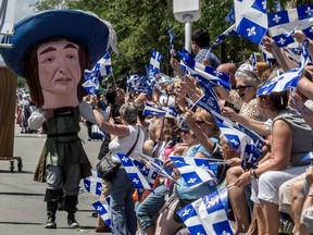 Paul de Chomedey de Maisonneuve, the founder of Montreal, greeted Montrealers along the Fête nationale parade, aka S-Jean-Baptiste Day parade route on St-Denis St. in Montreal on Saturday, June 24, 2017.