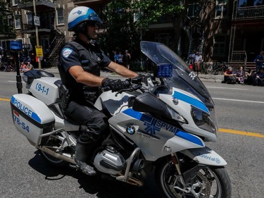 Montreal police monitored the Fête nationale parade along  St-Denis St. in Montreal on Saturday, June 24, 2017.