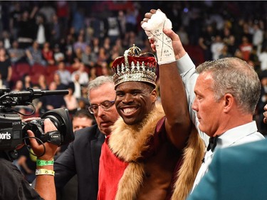 Adonis Stevenson celebrates after defeating Andrzej Fonfara during the WBC light heavyweight world championship match  at the Bell Centre on June 3, 2017 in Montreal, Quebec, Canada.  Adonis Stevenson defeated Andrzej Fonfara in the second round by way of technical knockout.