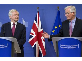 EU Chief Brexit Negotiator Michel Barnier, right, and British Secretary of State David Davis.