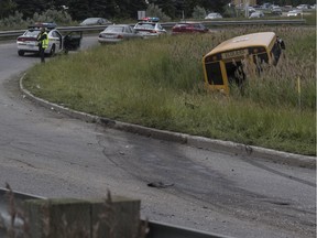 A school bus swerved sharply over the curb on the ramp of the interchange on Highway 640 East going towards Highway 15 North and landed on its wheels on the inside of the turn.