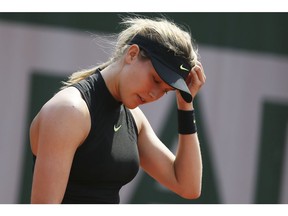 Westmount's Eugenie Bouchard gestures after missing a shot against Latvia's Anastasija Sevastova during their second round match of the French Open tennis tournament at the Roland Garros stadium in Paris, France. on Thursday, June 1, 2017.