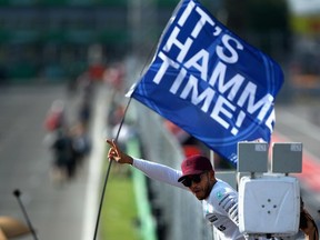 Race winner Lewis Hamilton of Britain and Mercedes GP celebrates his win with the fans during the Canadian Formula One Grand Prix at Circuit Gilles Villeneuve on June 11, 2017 in Montreal.