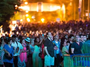 A crowd watches a performance at the Montreal International Jazz festival on Friday, July 5, 2013.