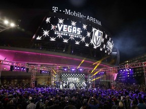 In this Nov. 22, 2016, file photo, the team name is displayed on a screen during an event to unveil the name of Las Vegas' National Hockey League franchise, in Las Vegas. The team will be called the Vegas Golden Knights.