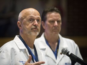 Hurley Trauma Surgeon, Dr. Donald Scholten, M.D. and Hurley Trauma and Surgical Critical Care Chief Dr. Leo Mercer give an update regarding Lt. Jeff Neville's condition. Neville was stabbed at Bishop International Airport Wednesday morning by suspected attacker Amor Ftouhi, a Montrealer from Tunisia.