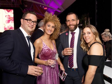 SNAPPED MID-SIPS: From left, guests Philippe Legault-Capozio, Carmela Lo Dico, Salvatore Di Stefano and Leilani Vallejo embrace the spirit at the annual ICCF Governors 'Ball "The Party" in Windsor Station's Salle des pas perdus.