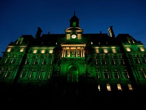 Montreal city hall is lit environmental green in Montreal on Thursday June 1, 2017. Mayor Coderre ordered the light change after Donald Trump announced that America would remove itself from the Paris climate change accord.