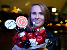 "I have a passion for food," says Liubou Chysakova, seen at La Fête des Restos in Montreal on Monday.  "With every bouquet, I want to include a card with a recipe based on the food that's in it."