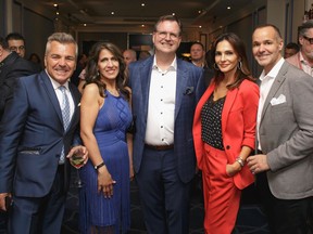 TEAM RITZ: Mose Persico, Arlene Torriani, husband/Ritz-Carlton CEO Andrew Torriani, Carmie Saputo and husband/Montreal Impact chief Joey Saputo at the VIP cocktail at the Ritz-Carlton Montreal Grand Prix Party presented with Décarie Motors and Aston Martin.