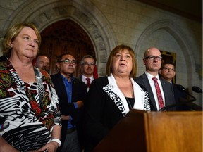 MaryAnn Mihychuk, Chair of the House of Commons Standing Committee on Indigenous and Northern Affairs, along with committee members, speaks in Ottawa on June 19, 2017.