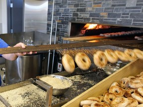 The St. Viateur Bagel outlet in Dollard-des-Ormeaux has developed a new hybrid wood/gas oven to comply with stricter regulations governing wood-burning stoves.