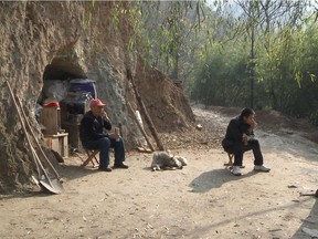 Lao Yu and his son Maofu in a scene from Diedie Weng's The Beekeeper and His Son: The beekeeper's situation is hardly an isolated case.