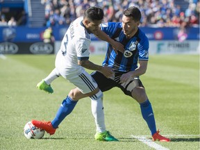 Impact defender Daniel Lovitz battles Whitecaps' Cristian Techera earlier this season. Outside back Ambroise Oyongo's injury offers an opportunity for Lovitz to play on a regular basis.