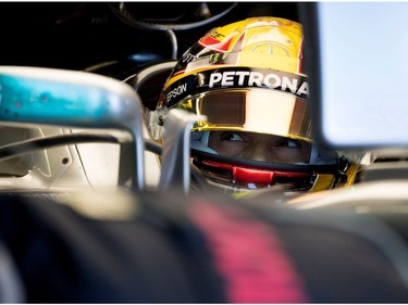 Mercedes Patronas Lewis Hamilton looks at his crew as he waits to return to the track during the morning practice session during the Canadian Formula 1 Grand Prix at Circuit Gilles Villeneuve in Montreal on Saturday, June 10, 2017.