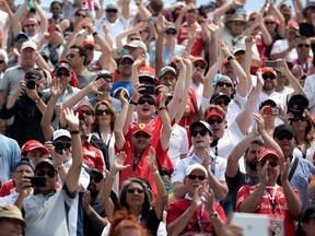 Ferrari fans cheer during the drivers parade at the Canadian Formula 1 Grand Prix at Circuit Gilles Villeneuve in Montreal on Sunday June 11, 2017.