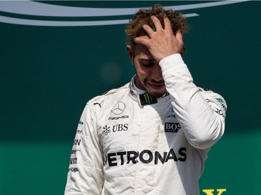 Lewis Hamilton of Mercedes Petronas appears to get emotional as he is introduced to the crowd after winning the Canadian Formula 1 Grand Prix at Circuit Gilles Villeneuve in Montreal on Sunday, June 11, 2017.