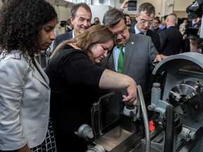 Dominique Anglade, Member for Saint-Henri–Sainte-Anne, Emmanuelle Raynauld and Mayor Denis Coderre, left to right, announced the opening of Espace Fabrique in St-Henri, on Friday, June 2, 2017.