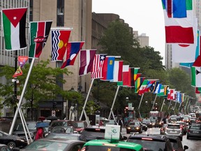 Flags line Sherbrooke street as part of La Balade pour la Paix in Montreal on Monday June 5, 2017.