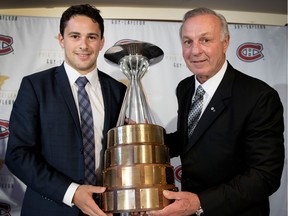 McGill University's Nathan Chiarlitti, left, accepts the Guy Lafleur Award of Excellence from Guy Lafleur in Montreal on Monday June 5, 2017.
