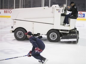 At the wheel of the Zambonni, F1 driver Valtteri Bottas tries to beat Habs Paul Byron in a race during promotional event at the Bell Sport Complex in Brossard on  Wednesday June 7, 2017.