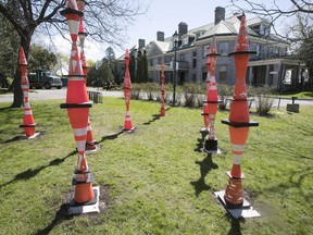 Art display of orange traffic cones at Stewart Hall on Friday May 12, 2017.