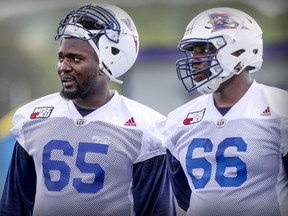 Alouettes' Jovan Olafioye, left, and Brian Simmons could play a big role in the team's offensive line this season.