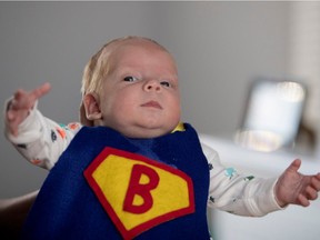 Benjamin Korres sports his superhero cape that was made for him by a nurse at the Montreal Jewish General Hospital. Korres was photographed at his West Island home  in Montreal on Wednesday May 31, 2017.