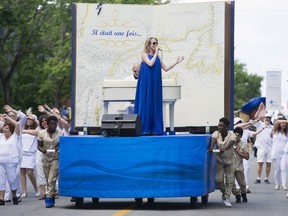 Annie Villeneuve entertains the crowd during the annual Fête nationale parade in Montreal, Saturday, June 24, 2017.
