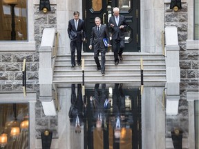 Power Financial executives Jeffrey Orr, Paul Desmarais Jr., and André Desmarais, left to right, in Montreal in 2014.