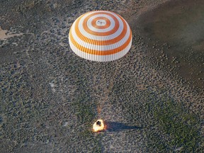 Photo of the day. The Soyuz MS-03 space capsule carrying the International Space Station (ISS) crew of Russian cosmonaut Oleg Novitskiy and French astronaut Thomas Pesquet lands in a remote area outside the town of Dzhezkazgan (Zhezkazgan), Kazakhstan, on June 2, 2017. / AFP PHOTO / POOL / SHAMIL ZHUMATOVSHAMIL ZHUMATOV/AFP/Getty Images