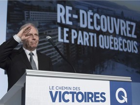PQ Leader Jean-François Lisée salutes the delegates during his opening speech at the first day of the Parti Québécois national council meeting in Quebec City on Saturday, January 14, 2017.