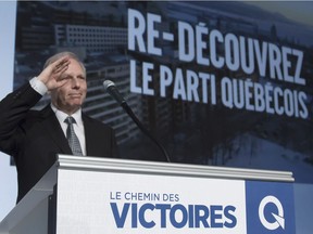 PQ Leader Jean-François Lisée salutes delegates during his opening speech at the first day of a Parti Quebecois national council meeting in Quebec City on Saturday, January 14, 2017.