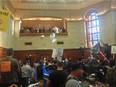 Montreal firefighters and municipal employees protesting against pension reforms stormed city hall on Aug. 18, 2014, tossing papers throughout the building and in council chambers minutes before city council was scheduled to begin its evening session.