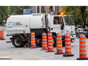 MONTREAL, QUE.: AUGUST 21, 2014 -- A city street cleaner navigates around construction cones on Rene Levesque Blvd east of Atwater St in Montreal, on Thursday, August 21, 2014. (Dave Sidaway / THE GAZETTE)

Generic
Dave Sidaway, The Gazette