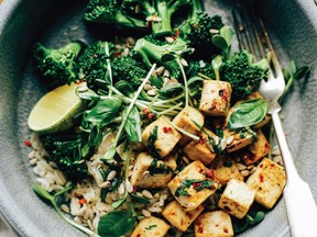 Tofu and broccoli are flavoured with lime and chili, roasted and served over brown rice.