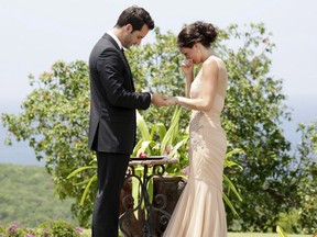 This publicity image released by ABC shows Chris Siegfried, left, placing a ring on the finger of Desiree Hartsock during the final rose ceremony on the romance competition series "The Bachelorette," on the season finale that aired Monday, Aug. 5, 2013 on ABC. (AP Photo/ABC, Francisco Roman)