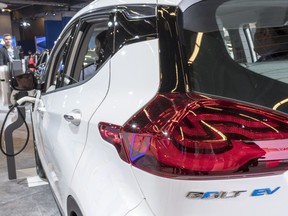 A Chevrolet Bolt electric car is seen during media day at the Montreal International Auto Show Thursday, January 19, 2017 in Montreal. Automakers are expressing concern that it will be difficult to comply with a new law in Quebec that requires them to sell a minimum number of electric, plug-in hybrid and hydrogen fuel-cell vehicles.