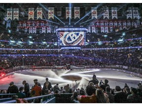 Canadiens fans watch light show prior to the start of Game 1 of the first round of the NHL playoffs against the New York Rangers in Montreal Wednesday April 12, 2017.