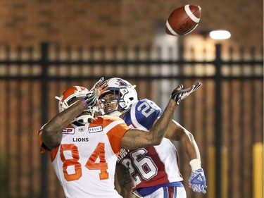 Montreal Alouettes defensive back Tyree Hollins interferes with British Columbia Lions receiver Emmanuel Arceneaux in the end zone during second half of Canadian Football League game in Montreal Thursday July 6, 2017. Hollins was penalized on the play and B.C. subsequently scored the game-winning touchdown.
